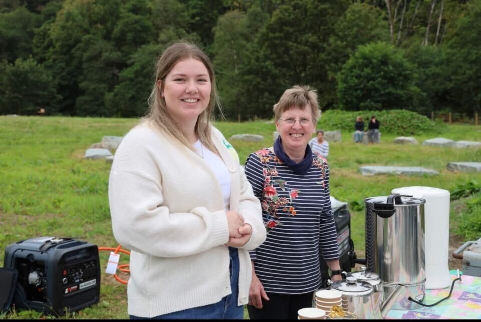 Volunteers serving tea and refreshments