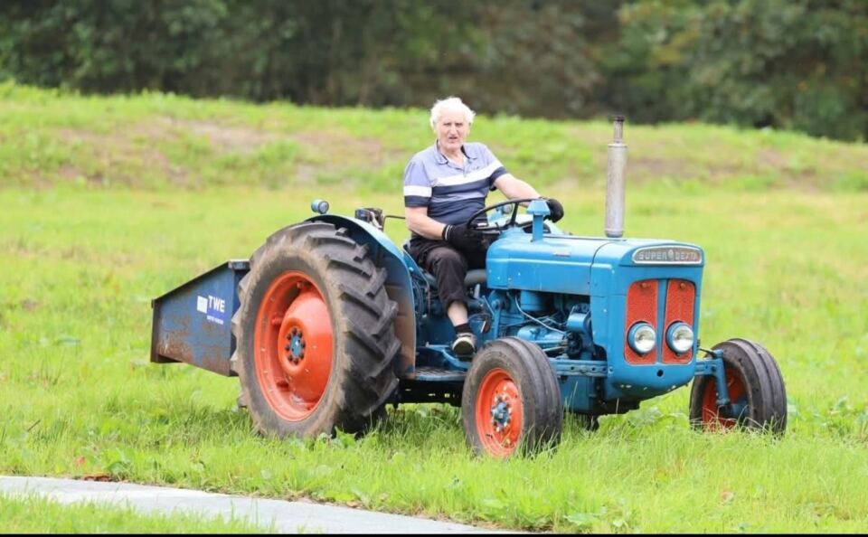 A vintage blue tractor at Dal an Duie